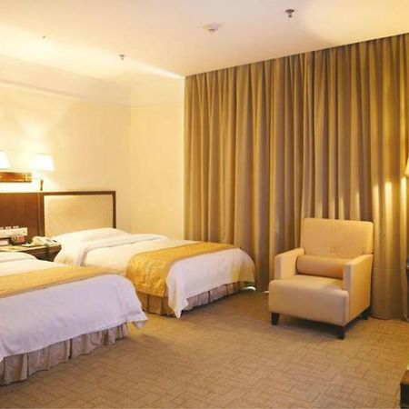 Wanxing Hotel Chao Yang Square Branch Наньнин Экстерьер фото
