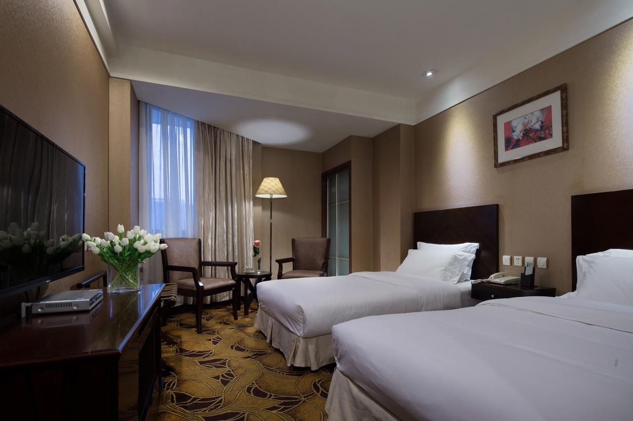 Wanxing Hotel Chao Yang Square Branch Наньнин Экстерьер фото